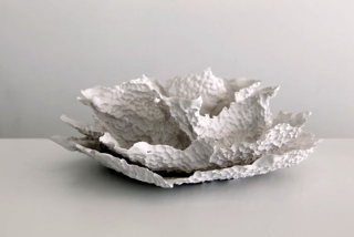 Illustration for article titled Weird Bowls Made Using Balloons Filled With Rice, Marbles, and Pasta